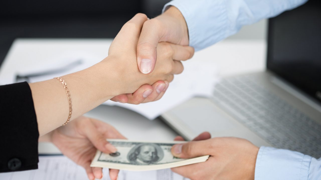 Car Accident Settlements with Hand Shake