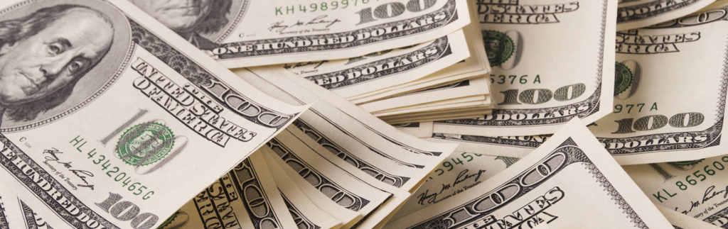 unpaid overtime wage theft - stack of money