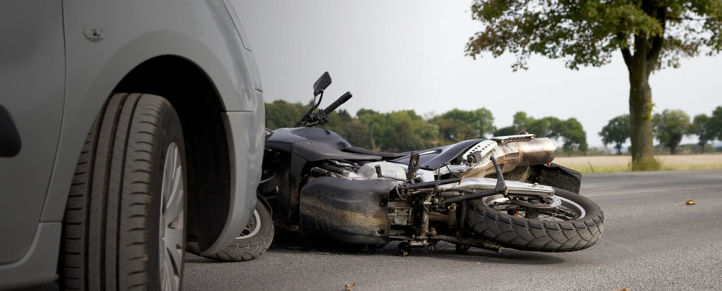 motorcycle meets car